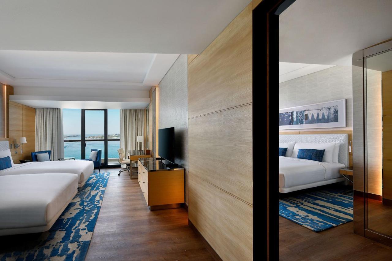 Palm Sea View Family Room, Connecting Guest room, Private Balcony, Beachfront Resort