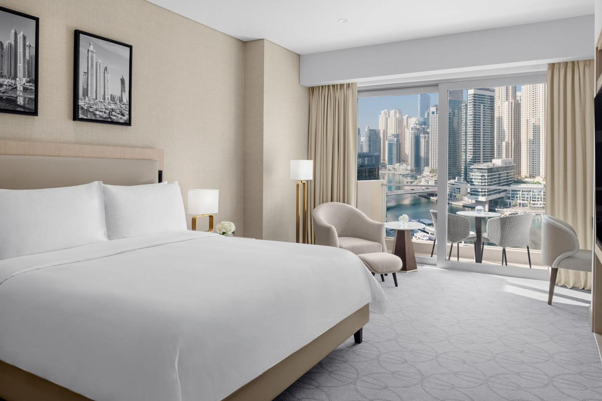 Executive Marina View Room King bed Club lounge access Lunch & Including direct access to Dubai Marina Mall & Marina Walk