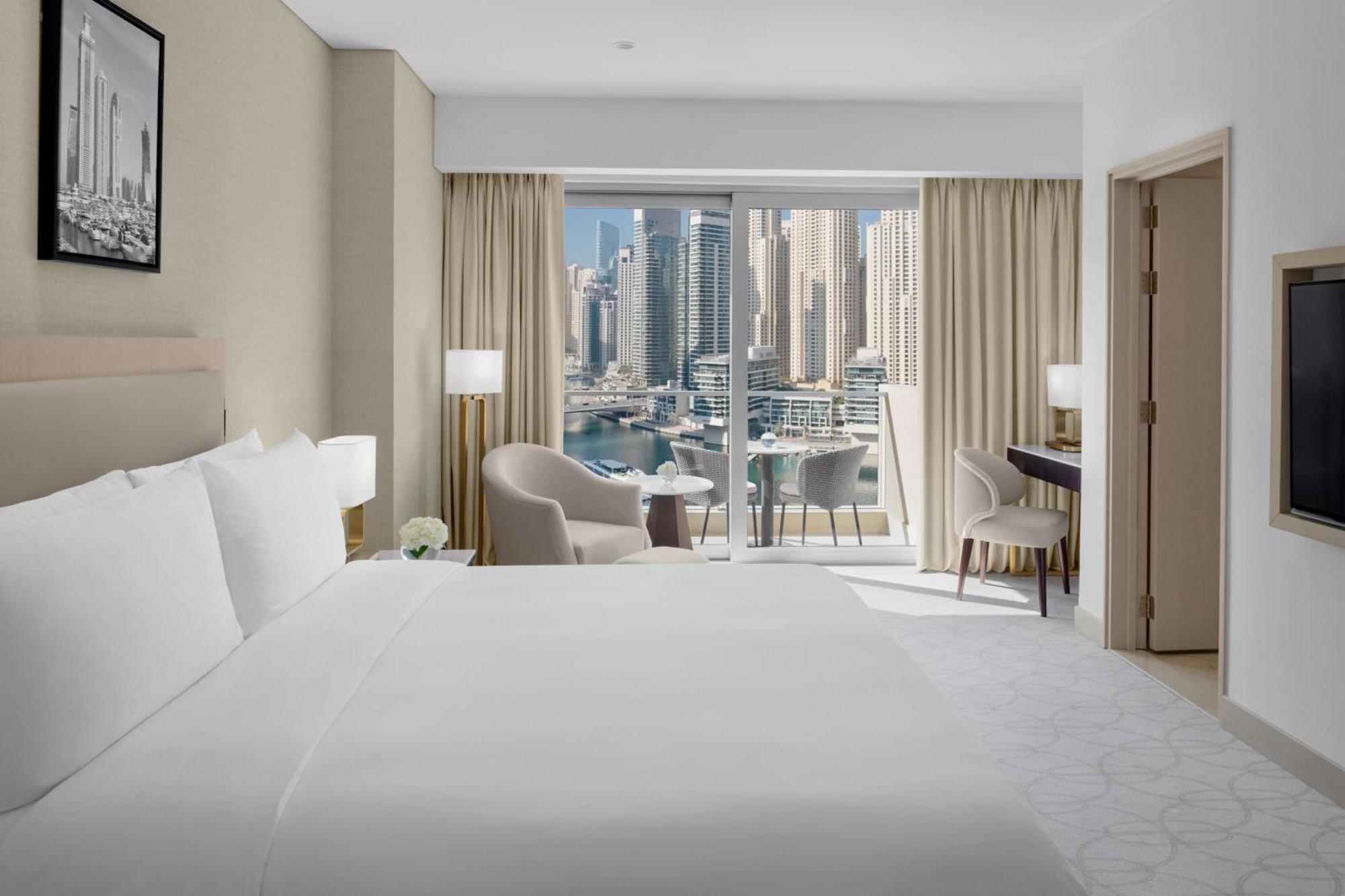 Executive Marina View Room King bed Club lounge access Lunch & Including direct access to Dubai Marina Mall & Marina Walk