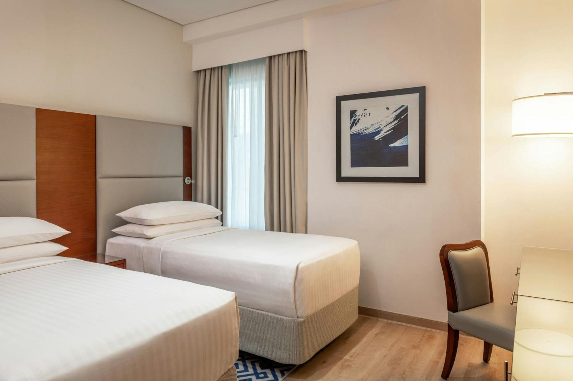 Three-Bedroom Suite with Partial Sea View