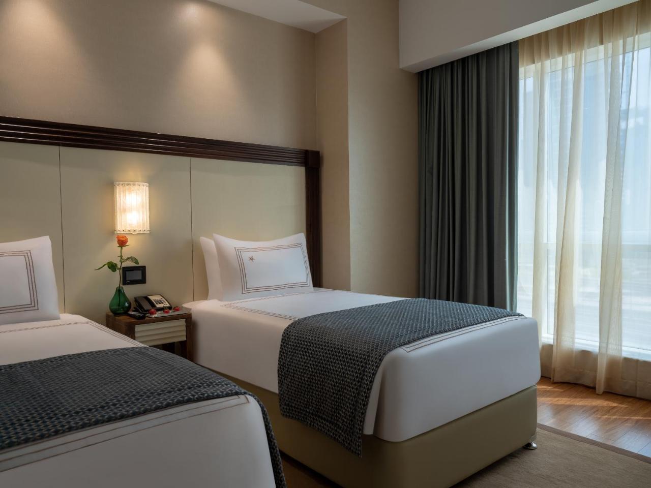Deluxe Twin Room Marina View Early check 11am & late check-out at 4pm on food & beverage valid until 31 August 2026 only,825146150:JPEG